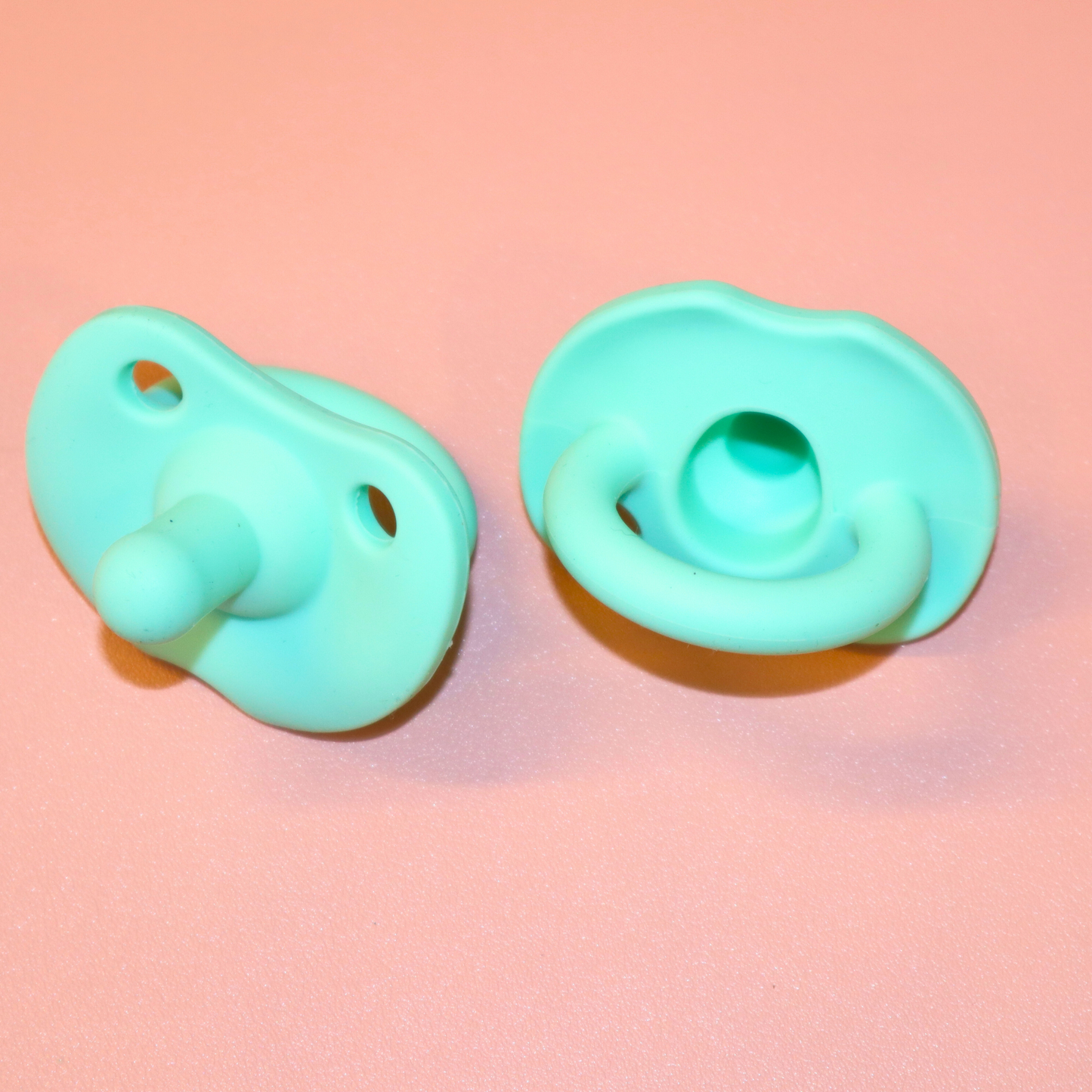 Smokk Pastellfarge Teether